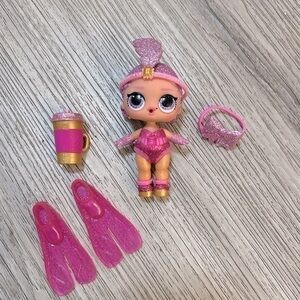 LOL Surprise! SHOWBABY glitter sparkle doll with accessories.